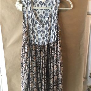 UMGEE sleeveless tunic. Tassel ties.